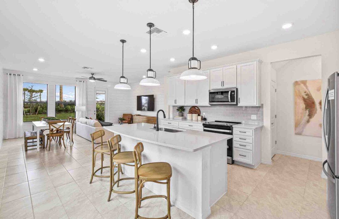 Two townhome models under construction by Centex at Sawgrass at Coral